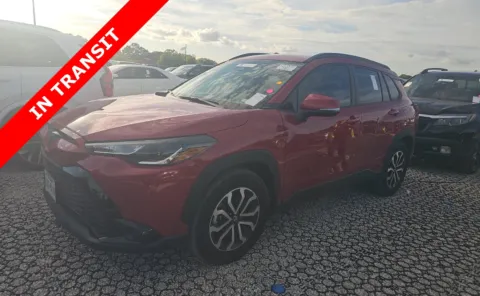 Red 2023 Toyota Corolla Cross Hybrid SE for sale in Alvin, TX