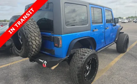 More photos of 2015 Jeep Wrangler Unlimited Sahara at Auto Boutique Texas, TX