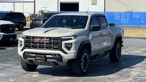 Beige 2026 GMC Canyon 4WD AT4 for sale in Alvin, TX