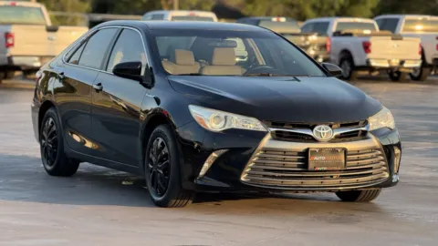 Black 2015 Toyota Camry Hybrid LE for sale in Alvin, TX