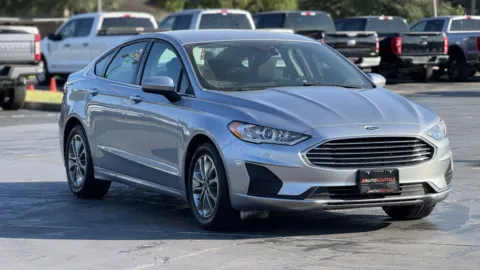 Red 2020 Ford Fusion SE for sale in Alvin, TX