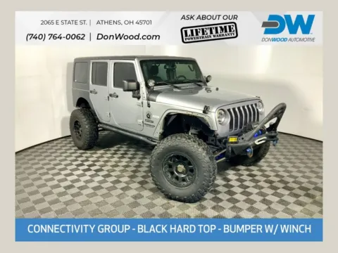 Silver 2014 Jeep Wrangler Unlimited Sport for sale in Athens, OH