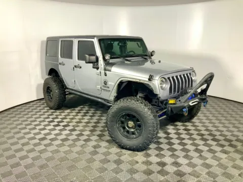 Photos of 2014 Jeep Wrangler Unlimited Sport for sale in Athens, OH at Don Wood Ford Lincoln