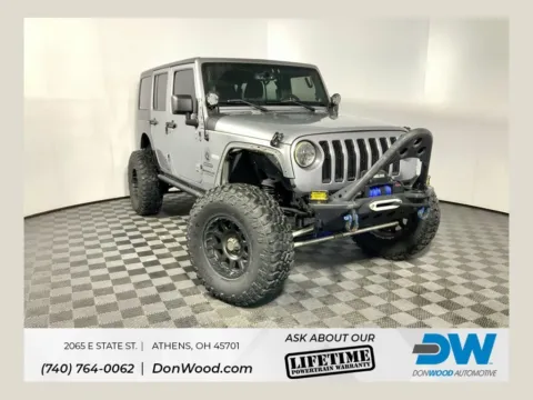 Silver 2014 Jeep Wrangler Unlimited Sport for sale in Athens, OH