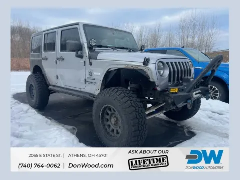 Silver 2014 Jeep Wrangler Unlimited Sport for sale in Athens, OH