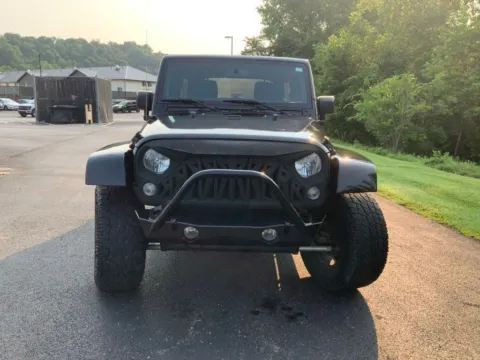 Another view of 2015 Jeep Wrangler Unlimited Sahara for sale in Athens, OH at Don Wood Ford Lincoln