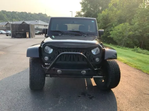Another view of 2015 Jeep Wrangler Unlimited Sahara for sale in Athens, OH at Don Wood Ford Lincoln