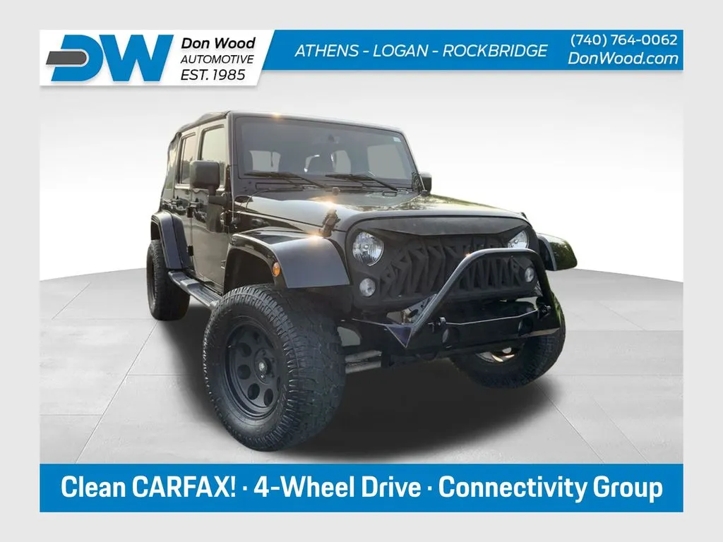 Black 2015 Jeep Wrangler Unlimited Sahara for sale in Athens, OH