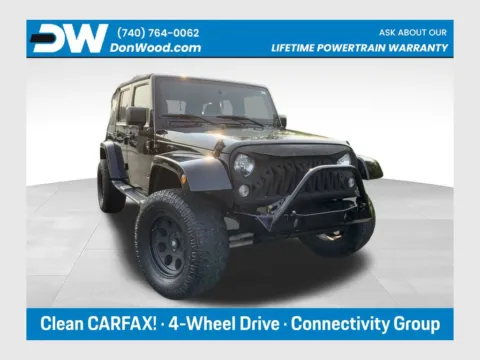 Black 2015 Jeep Wrangler Unlimited Sahara for sale in Athens, OH