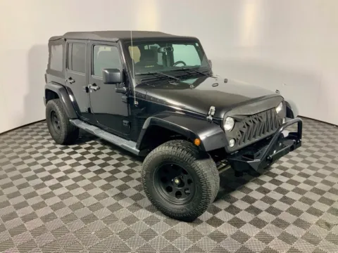Photos of 2015 Jeep Wrangler Unlimited Sahara for sale in Athens, OH at Don Wood Ford Lincoln