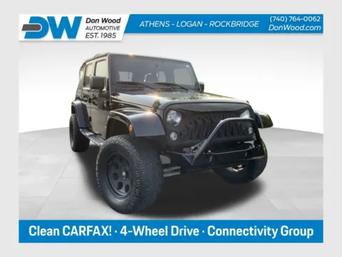 Black 2015 Jeep Wrangler Unlimited Sahara for sale in Athens, OH