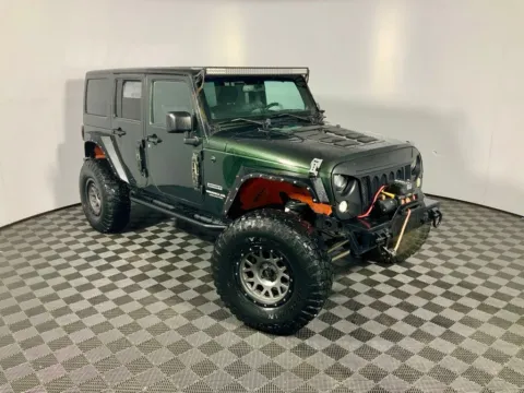Photos of 2011 Jeep Wrangler Unlimited Sport for sale in Athens, OH at Don Wood Ford Lincoln