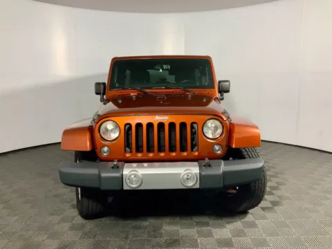 Another view of 2014 Jeep Wrangler Unlimited Sahara for sale in Athens, OH at Don Wood Ford Lincoln