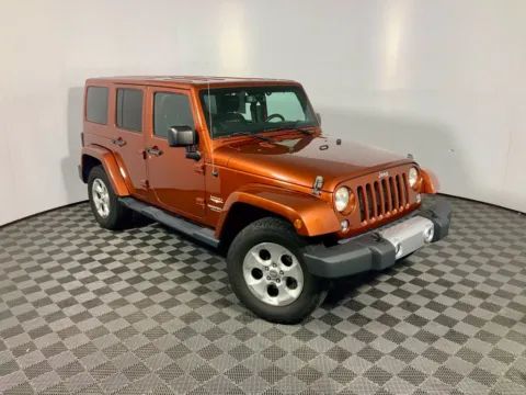 Photos of 2014 Jeep Wrangler Unlimited Sahara for sale in Athens, OH at Don Wood Ford Lincoln