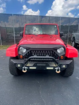 Photos of 2013 Jeep Wrangler Unlimited Sahara for sale in Athens, OH at Don Wood Ford Lincoln