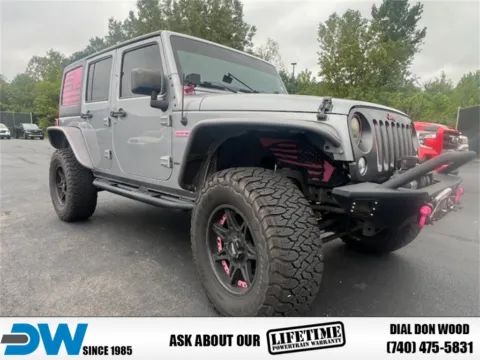 Silver 2016 Jeep Wrangler Unlimited Freedom Edition for sale in Athens, OH