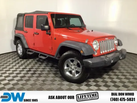 Red 2016 Jeep Wrangler Unlimited Sport for sale in Athens, OH