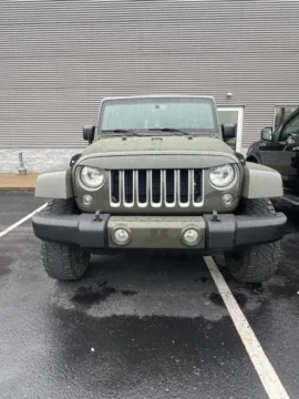 Photos of 2016 Jeep Wrangler Unlimited Sahara for sale in Athens, OH at Don Wood Ford Lincoln