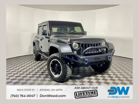 Black 2016 Jeep Wrangler Unlimited Willys for sale in Athens, OH
