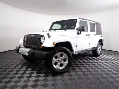 Photos of 2013 Jeep Wrangler Unlimited Sahara for sale in Rockbridge, OH at Don Wood Chrysler Dodge Jeep Ram