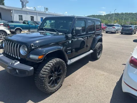 Photos of 2021 Jeep Wrangler Unlimited Sahara 4xe for sale in Athens, OH at Don Wood Hyundai