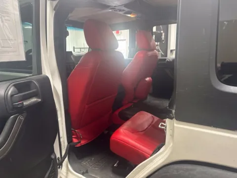 Photos of 2015 Jeep Wrangler Unlimited Sport for sale in Athens, OH at Don Wood Hyundai