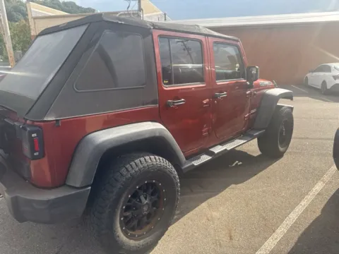 Photos of 2014 Jeep Wrangler Unlimited Sport for sale in Athens, OH at Don Wood Hyundai