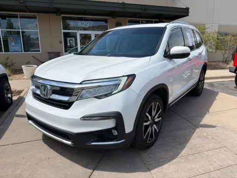 Photos of 2021 Honda Pilot AWD Elite for sale in Littleton, CO at AutoTrek