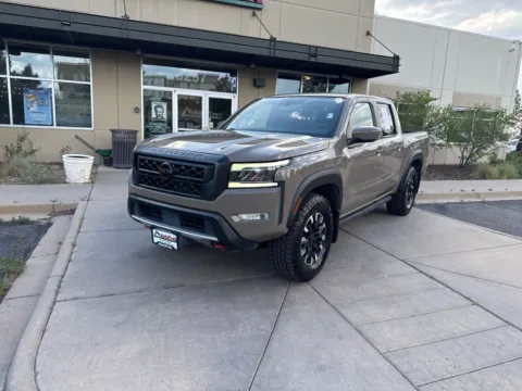 Photos of 2023 Nissan Frontier Crew Cab PRO-4X 4x4 for sale in Littleton, CO at AutoTrek