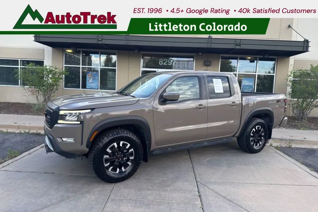 Beige 2023 Nissan Frontier Crew Cab PRO-4X 4x4 for sale in Littleton, CO
