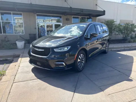Photos of 2022 Chrysler Pacifica Hybrid Touring L for sale in Littleton, CO at AutoTrek