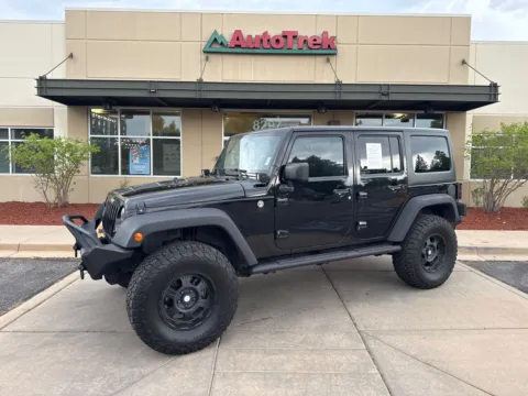 Photos of 2013 Jeep Wrangler Unlimited Sport for sale in Littleton, CO at AutoTrek