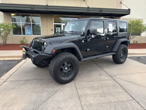 Another view of 2013 Jeep Wrangler Unlimited Sport for sale in Littleton, CO at AutoTrek