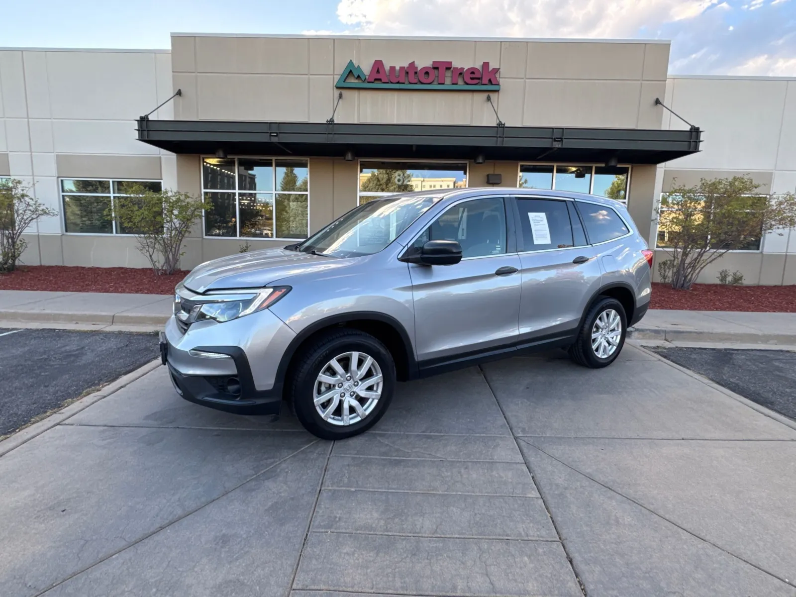 Silver 2019 Honda Pilot LX for sale in Littleton, CO