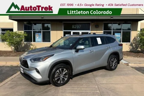 Silver 2021 Toyota Highlander Hybrid XLE for sale in Littleton, CO