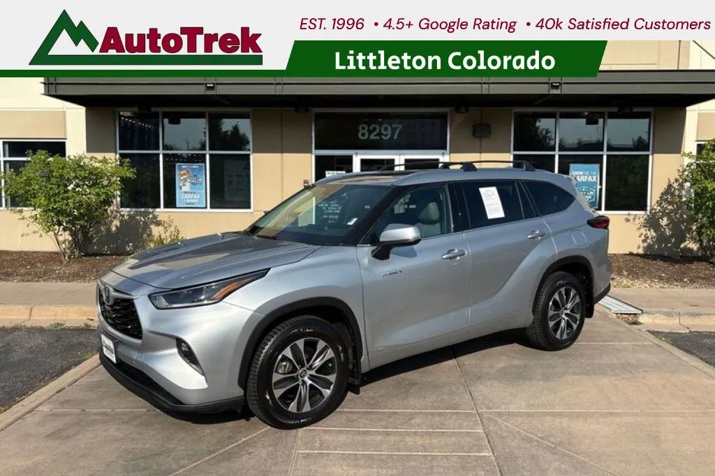 Silver 2021 Toyota Highlander Hybrid XLE for sale in Littleton, CO