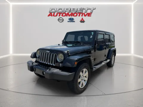 Black 2016 Jeep Wrangler Sahara for sale in Terre Haute, IN