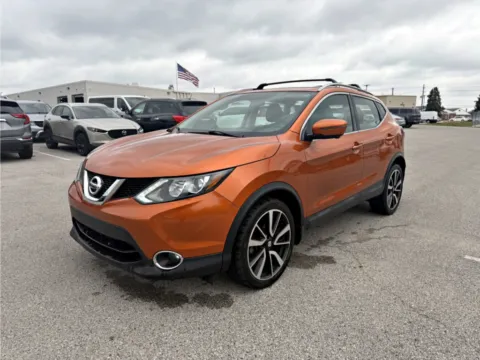 Orange 2017 Nissan Rogue Sport SL for sale in Terre Haute, IN
