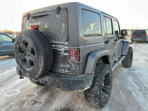 More photos of 2014 Jeep Wrangler Unlimited Sahara at Auto Boutique Ohio, OH