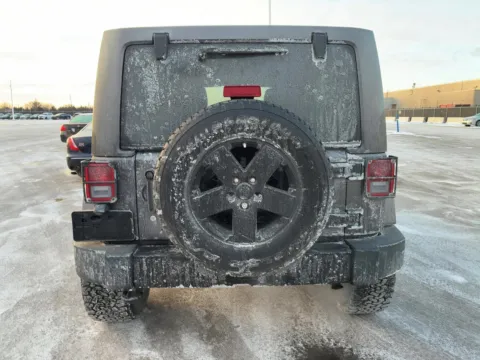 More photos of 2014 Jeep Wrangler Unlimited Sahara at Auto Boutique Ohio, OH