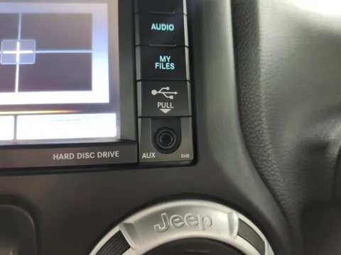 More photos of 2014 Jeep Wrangler Unlimited Sahara at Auto Boutique Ohio, OH