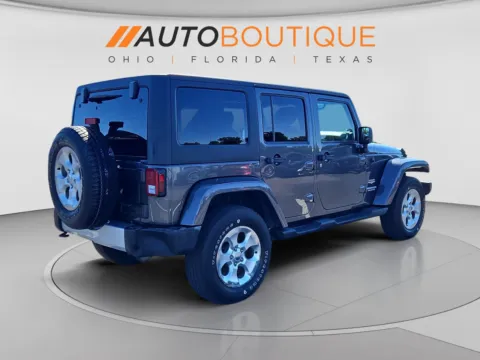 More photos of 2014 Jeep Wrangler Unlimited Sahara at Auto Boutique Ohio, OH