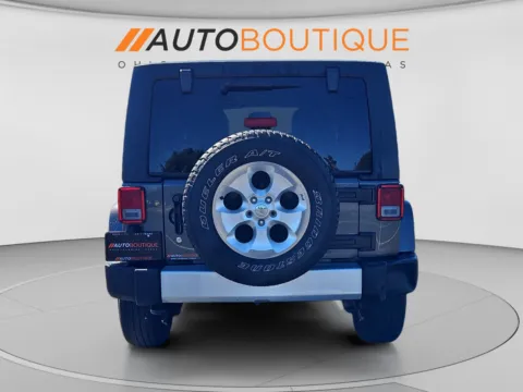 More photos of 2014 Jeep Wrangler Unlimited Sahara at Auto Boutique Ohio, OH