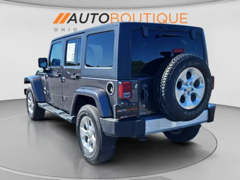 Another view of 2014 Jeep Wrangler Unlimited Sahara for sale in Columbus, OH at Auto Boutique Ohio