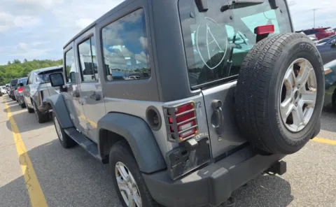 Another view of 2013 Jeep Wrangler Unlimited Sport for sale in Columbus, OH at Auto Boutique Ohio