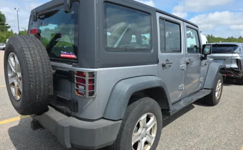 More photos of 2013 Jeep Wrangler Unlimited Sport at Auto Boutique Ohio, OH