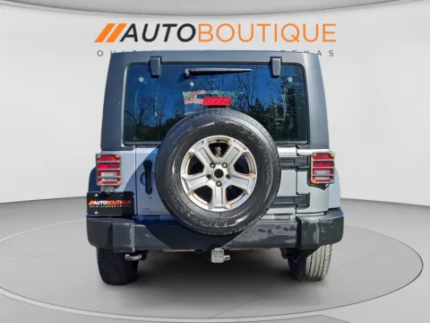 More photos of 2013 Jeep Wrangler Unlimited Sport at Auto Boutique Ohio, OH