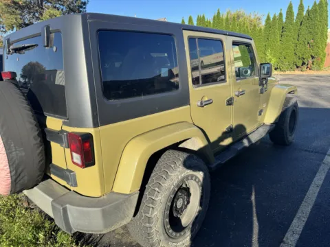 Another view of 2013 Jeep Wrangler Unlimited Sahara for sale in Columbus, OH at Auto Boutique Ohio