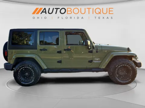 More photos of 2013 Jeep Wrangler Unlimited Sahara at Auto Boutique Ohio, OH