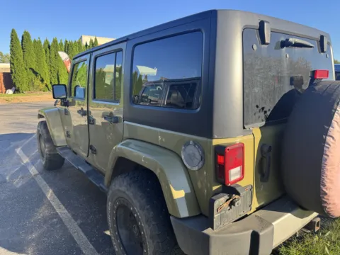 More photos of 2013 Jeep Wrangler Unlimited Sahara at Auto Boutique Ohio, OH